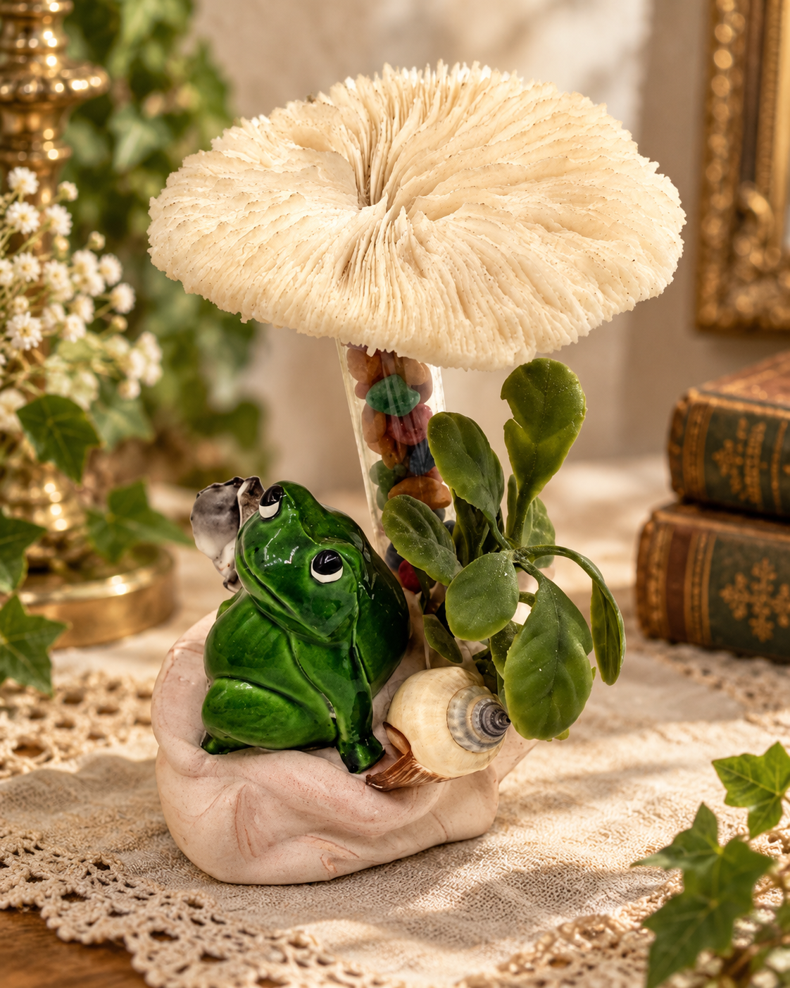 Curious objects — whimsical frog figurine holding a mushroom umbrella